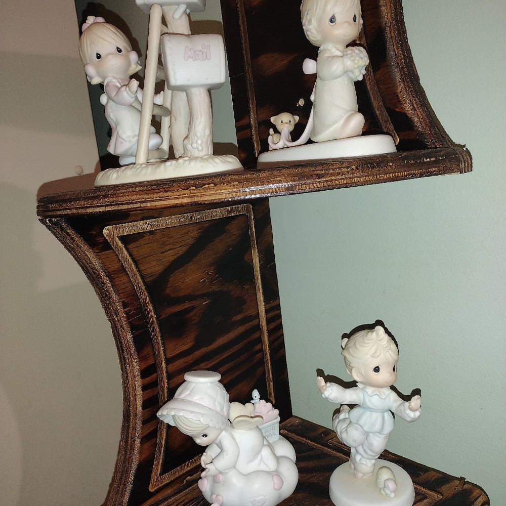 4 precious moments figurines